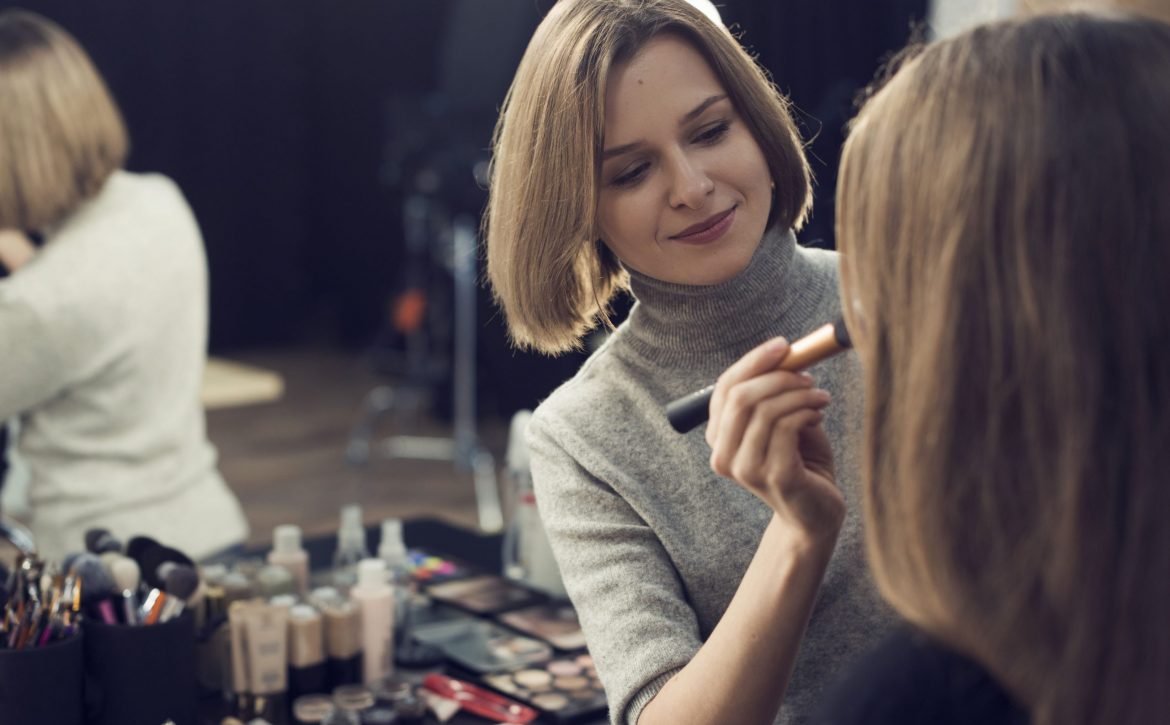 beautiful-stylist-applying-powder-model (2) (1)