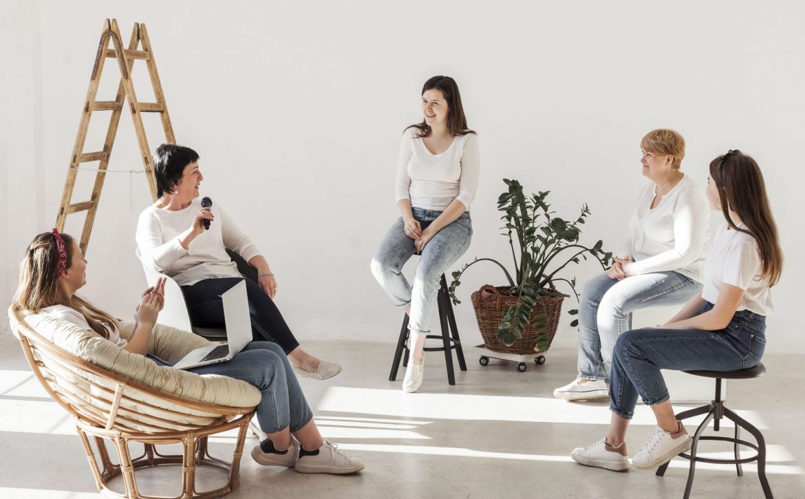 women-white-shirts-having-conference (1)